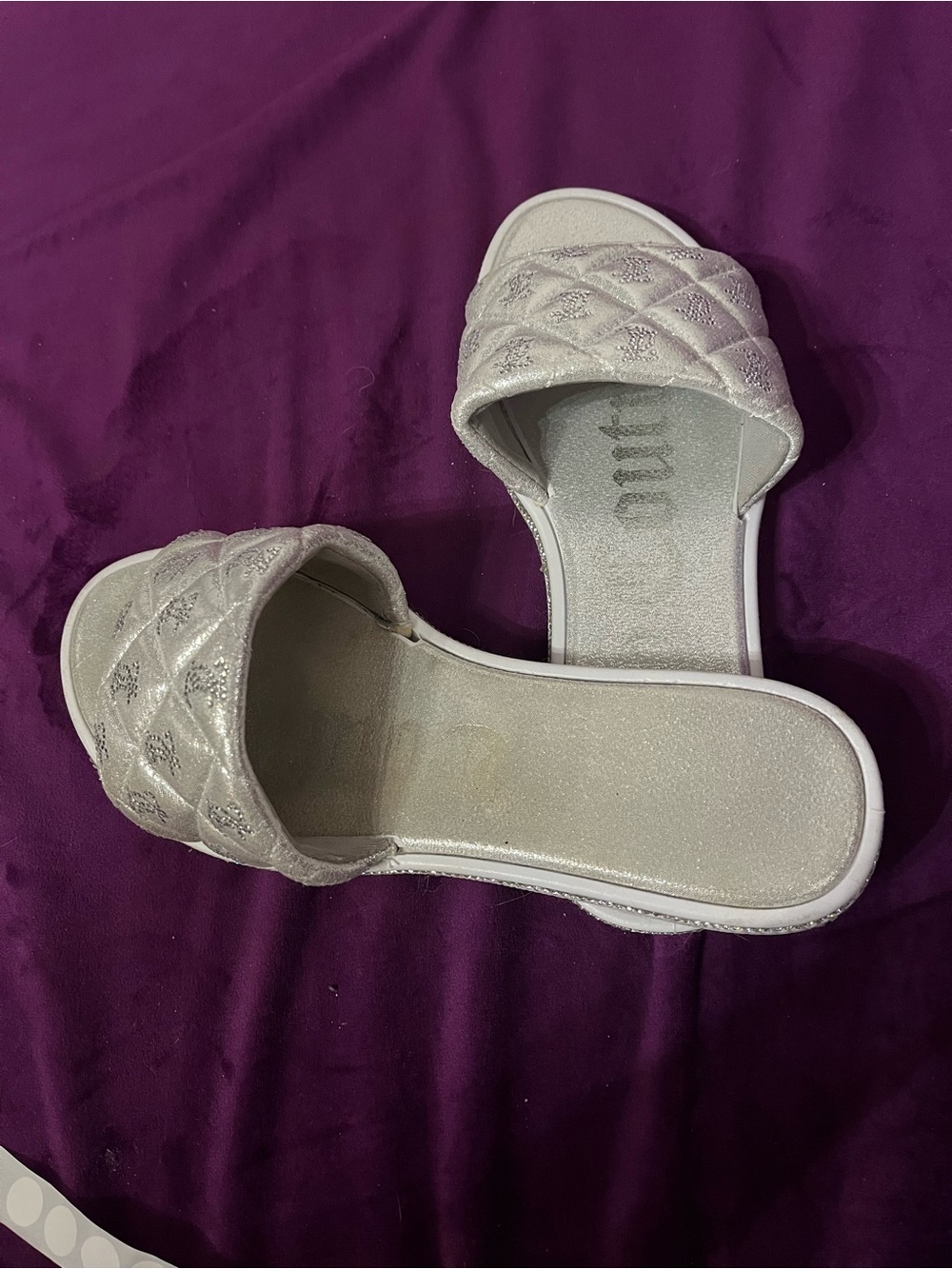 15. Juicy Couture quilted slides
